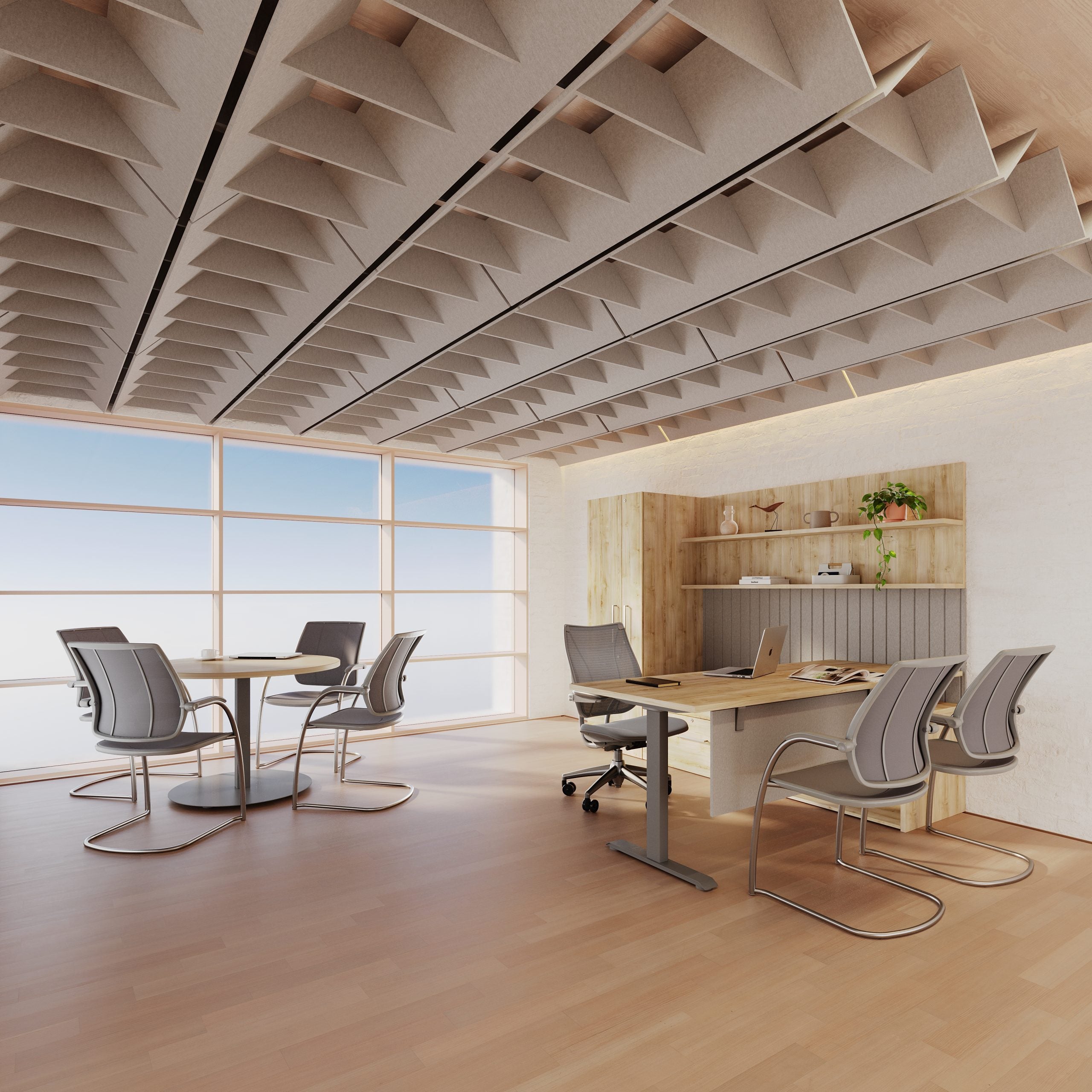 Modern office space with wooden desks, chairs, and large windows.